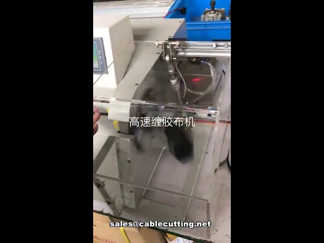 Macchina automatica per avvolgimento e nastratura cavi multifilamento con copertura protettiva