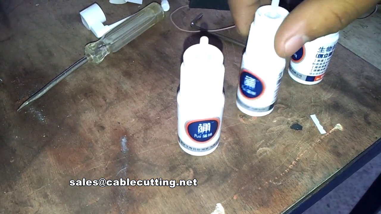 Etichettatrice automatica per bottiglie con stampante codici - Test etichette trasparenti